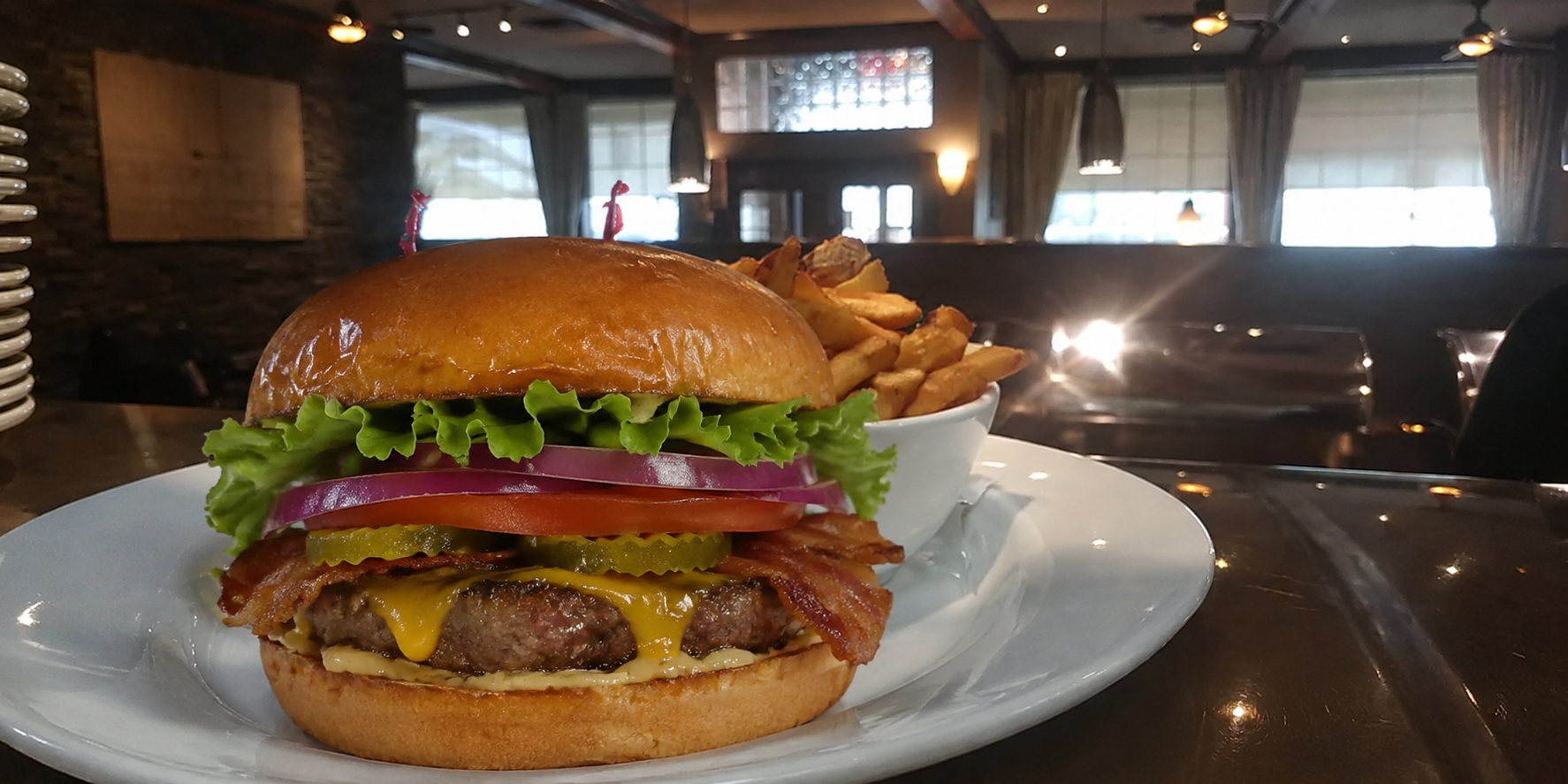 Burger and fries at Second Home Cafe & Grill