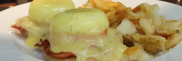 Eggs Benedict breakfast dish at Second Home Cafe & Grill